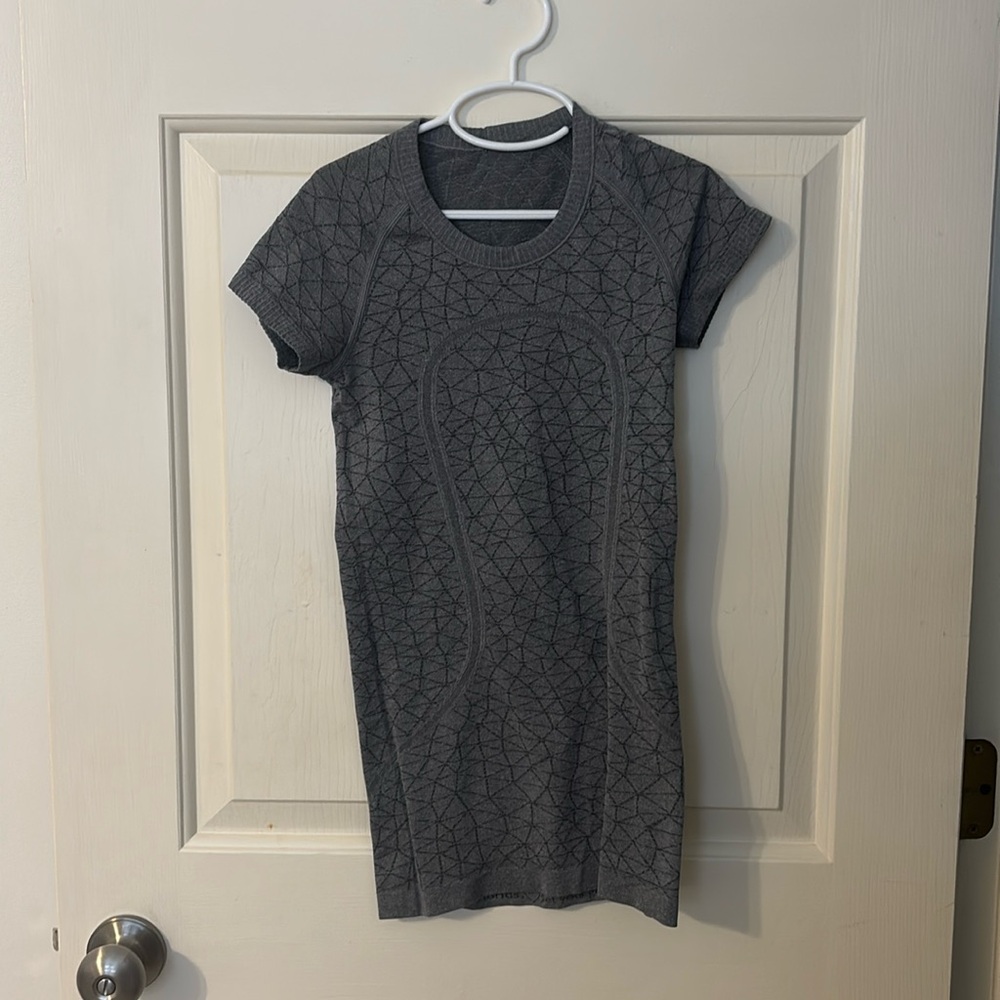 This is a grey patterned swiftly tee from lululemon.